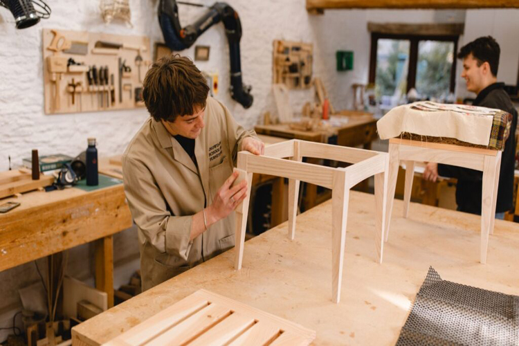 Carpenter crafting custom wooden furniture
